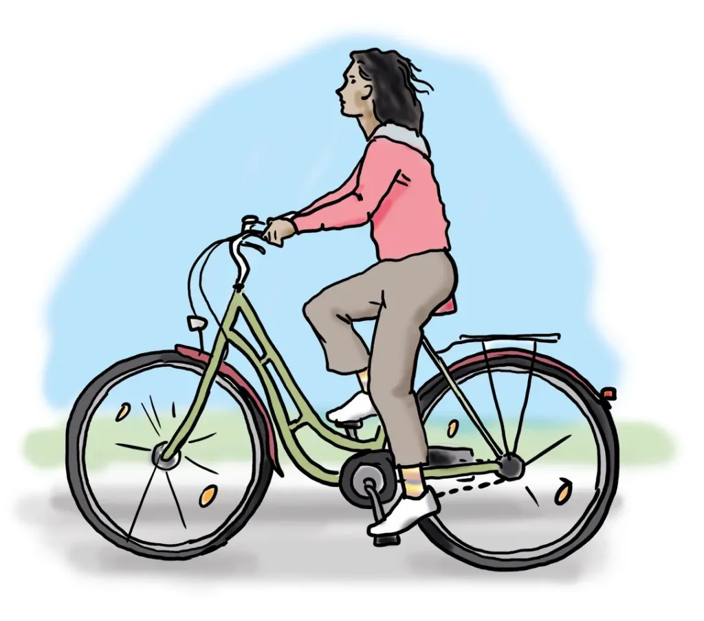 Eine Frau fährt Fahrrad.
